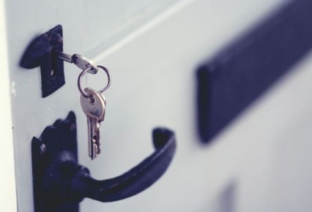 Smart Locks - black and silver padlock on white door