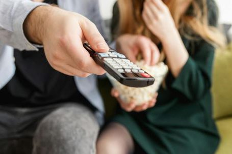 TV - Man Holding Remote Control