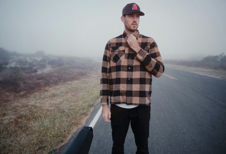 man-in-brown-and-black-plaid-dress-shirt