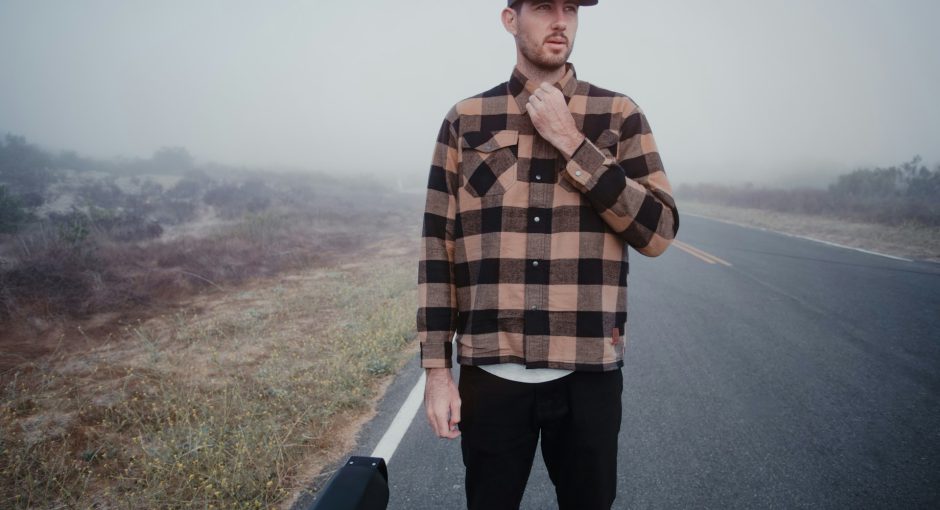 man-in-brown-and-black-plaid-dress-shirt
